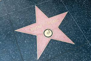 Los Angeles, United States - May 18, 2015: Star of Britney Spears at the pavement of the Walk of Fame in Hollywood. The star is reserved for the name of a celebrity from the movie industry.
